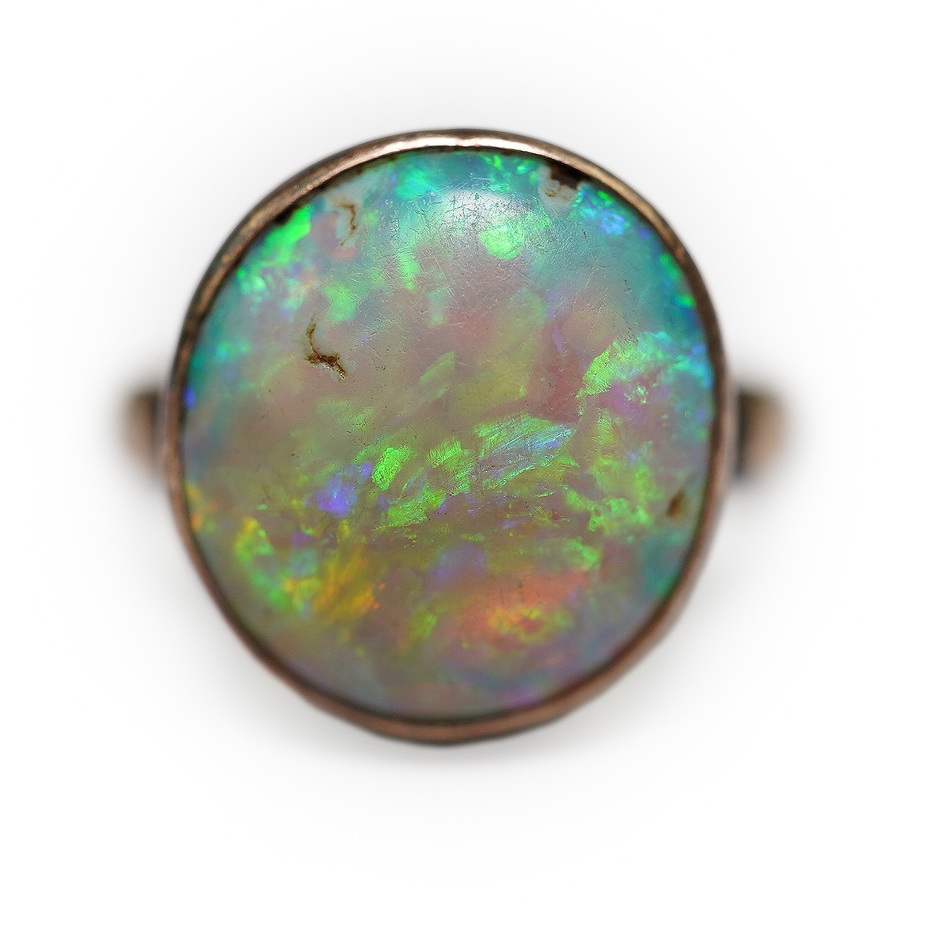 A 9ct gold opal dress ring, size J, gross weight 4.1 grams.